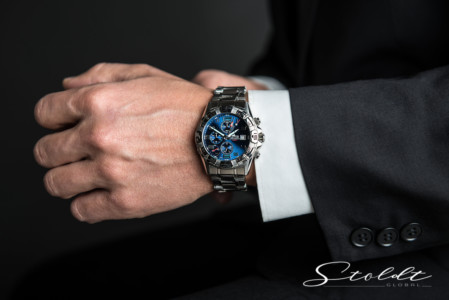 Business photography of a businessman in a suit wearing a wrist watch