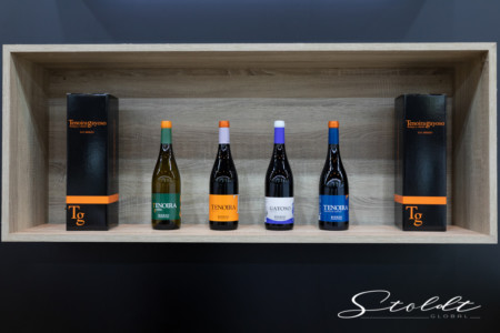 Business photography at the Madrid fair showing wine bottles on a shelf