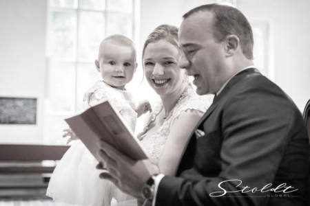 Wedding photography in Valencia Sagunto Castellón and Mallorca showing bride and groom with child