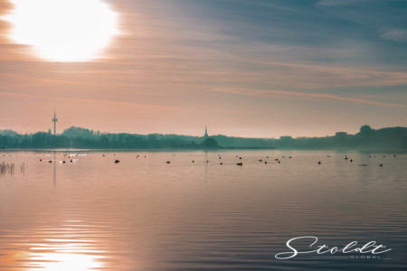 Nature and landscape photography showing a lake at sunrise in Germany