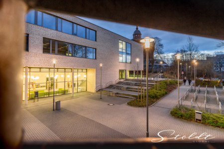 architecture photography of a school building in the early morning