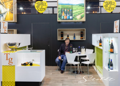 Business photography at the Madrid fair showing owner of a wine producing company