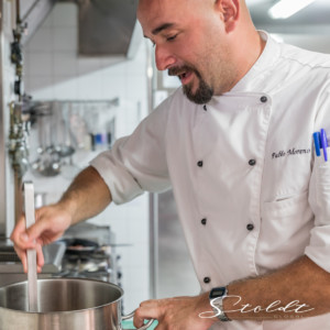 Business photography cook preparing food in a hotel restaurant