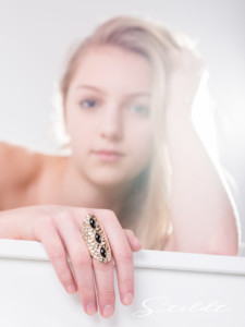 Jewellery or jewelry photography beauty portrait of girl with ring