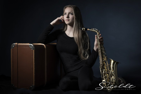Portrait photography of a musician with saxophone